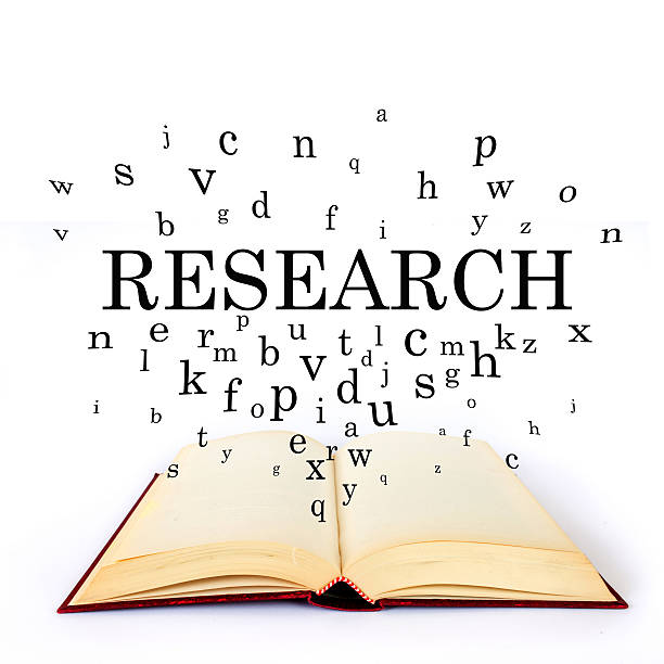 istock Research, word on the book with letters flying 502518800