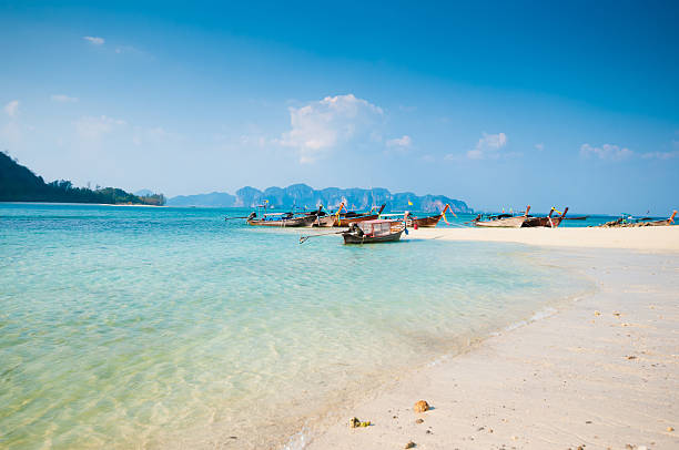 istock Long Tail boat  in the beautiful beach 502520118