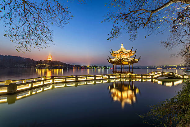 istock beautiful hangzhou in twilight and ancient pavilion 502520212