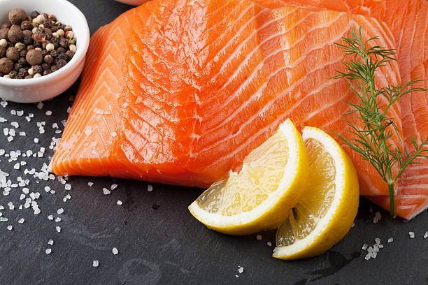 istock Salmon and spices on stone table 502521054