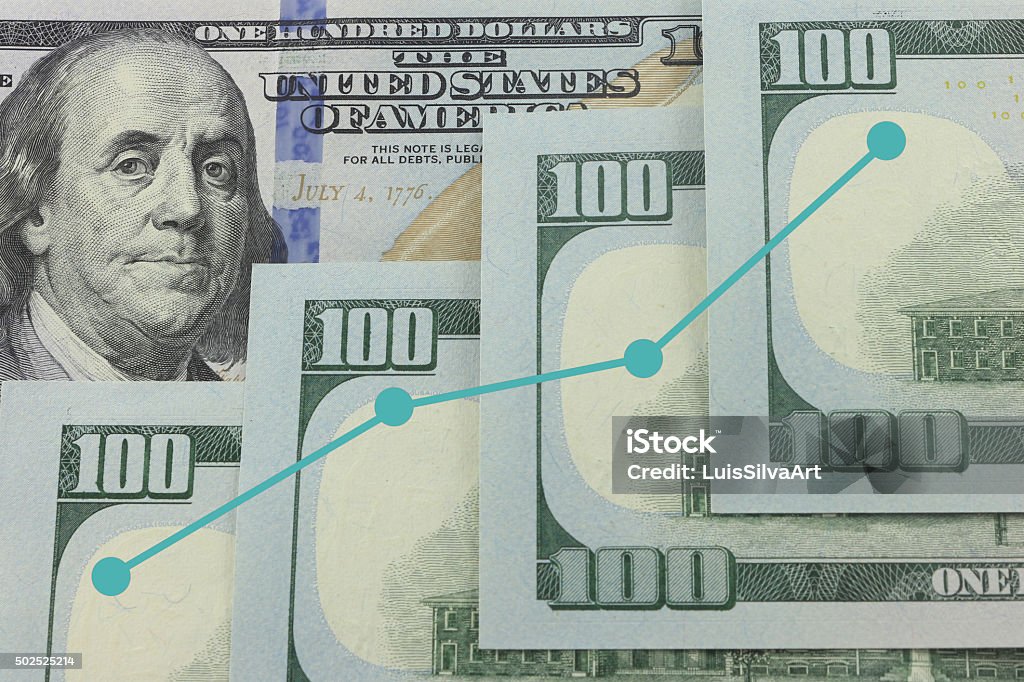 Earnins In picture Hundred Bill with Grow line showing earnings 2015 Stock Photo