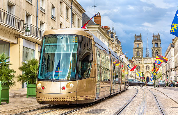 Tram on Jeanne d'Arc street in Orleans - France Tram on Jeanne d'Arc street in Orleans - France orleans france photos stock pictures, royalty-free photos & images