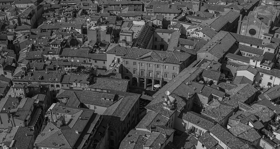 A day view of the Bologna rooftop line in black and white.