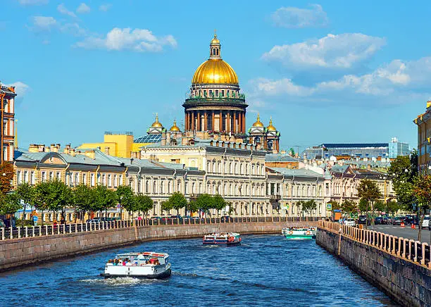 Photo of St Isaac's Cathedral across Moyka river