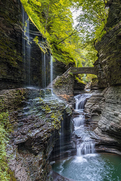 Rainbow Falls Rainbow Falls of Watkins Glen State Park Finger Lakes region of New York state. watkins glen stock pictures, royalty-free photos & images