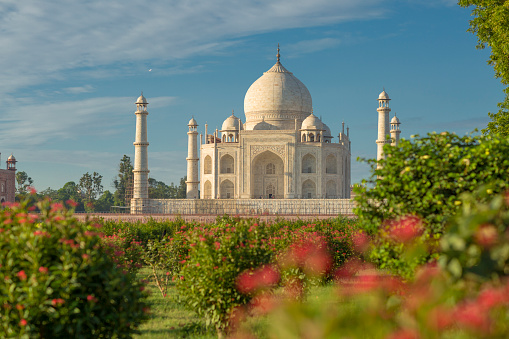 The Taj Mahal with reflection in courtyard pool in Agra, India.