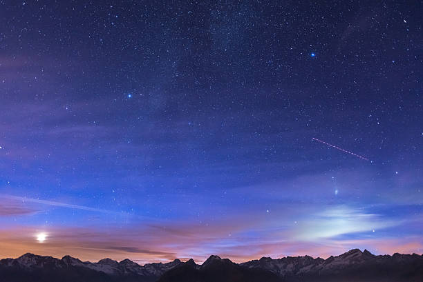 istock Night on the Alps under starry sky and moonlight 502530554