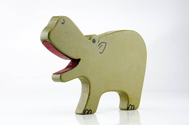 istock Wooden Hippo Three Quarter on White 502531740