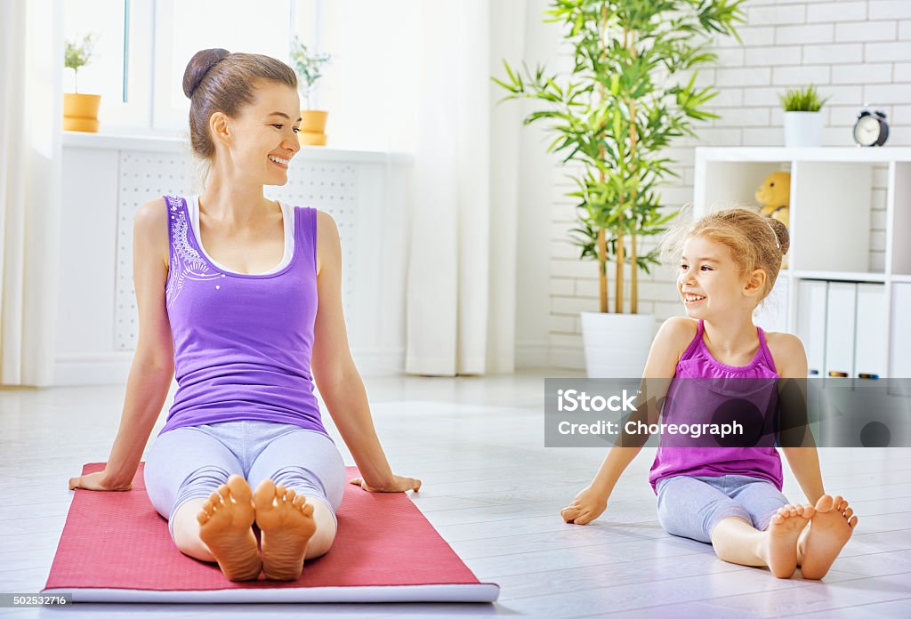 going in for sport girl is engaged in sports with child 2015 Stock Photo