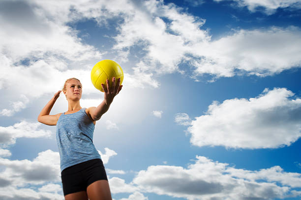 istock Beach Volleyball Girl Serving a Ball 502546648