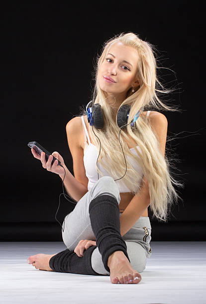 istock Young slim woman sitting on knees. 502549632
