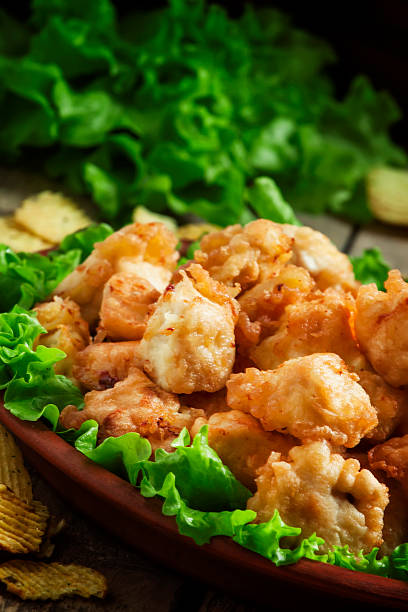 istock Nuggets, chicken tempura with green salad 502551266