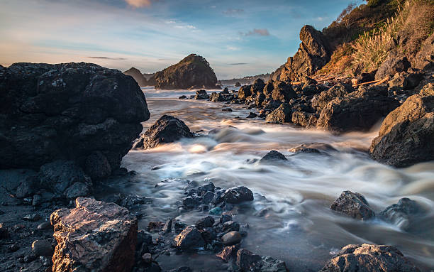 istock Rocky Pacific Coastline at Sunset 502552730