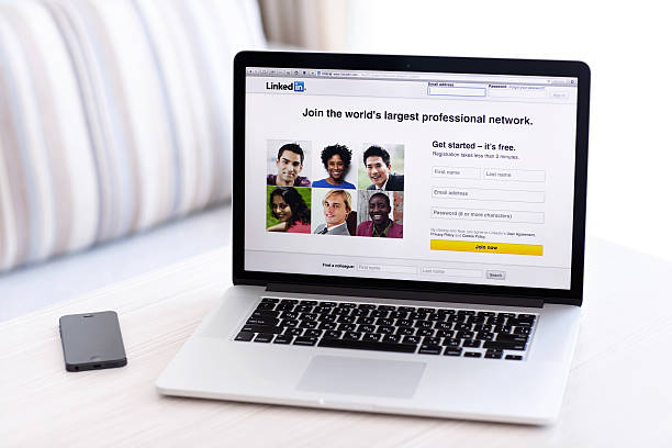 MacBook Pro Retina with LinkedIn home page on the screen stock photo