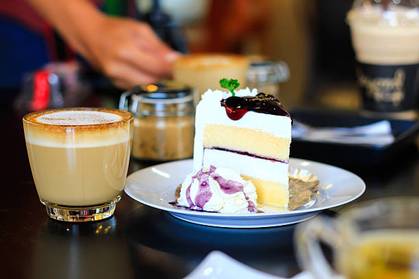 istock cheese cake with blue berry on top and Coffee, cappuccino 502559049