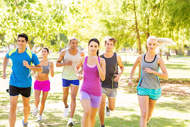 istock Group Of Multi-Ethnic Friends Jogging In Park 502559357