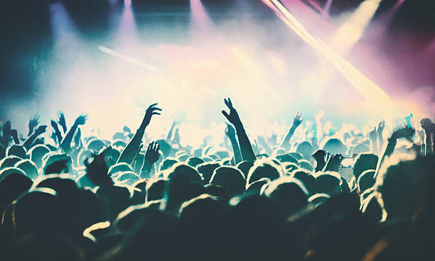 istock People at concert party. 502560004