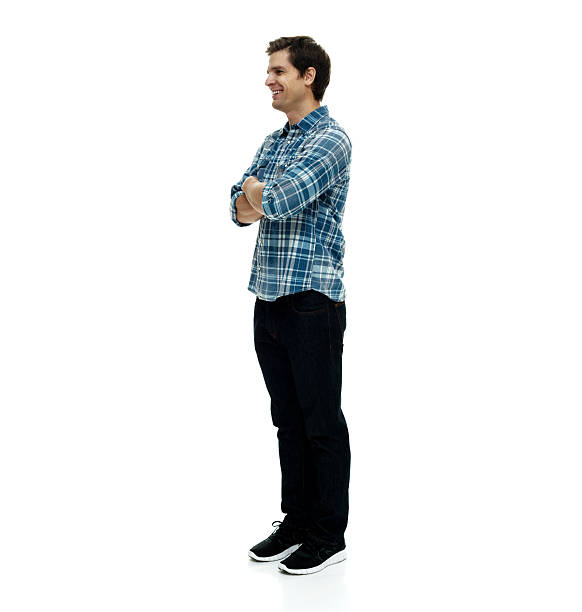 istock Smiling casual man standing with arms crossed 502560288