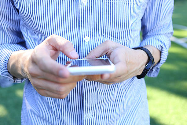istock Business man holding and use smartphone 502560530