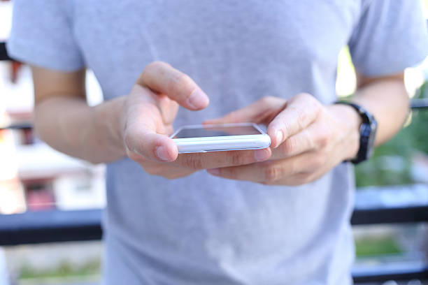 istock Man holding and use smartphone 502560812