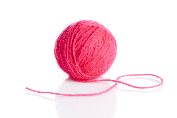istock Ball of knitting yarn on a white background 502563681
