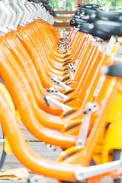 Taipei, Taiwan - June 19, 2014: A station in Taipei's hugely popular YouBike bicycle rental system. In March 2014 there were about 5,200 bicycles for rent at 158 rental stations around the city. In January 2014, the system, which was launched in 2009, had accumulated 13.8 million trips.
