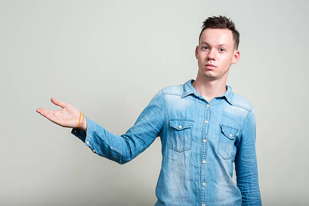 istock Portrait of man showing copy space 502573826