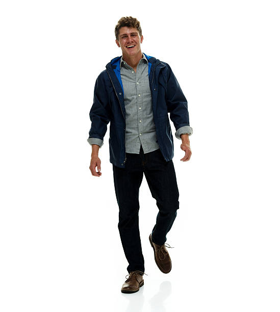 istock Cheerful casual man walking 502573842