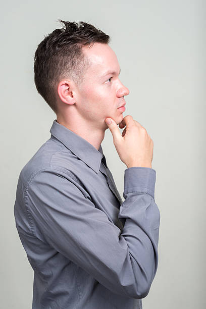 istock Portrait of man thinking 502574144