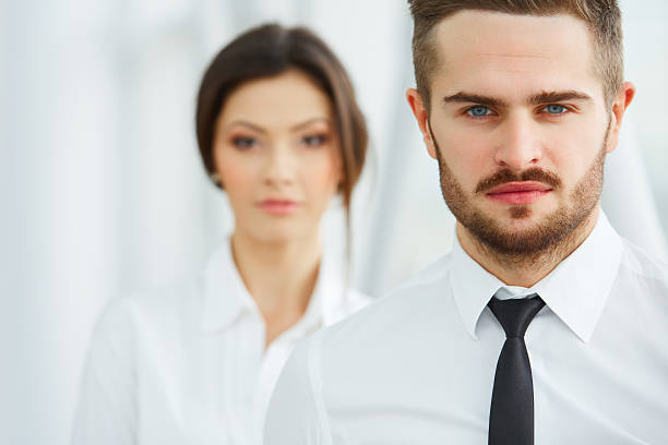 istock Business Team. Happy smiling people standing in office 502575820