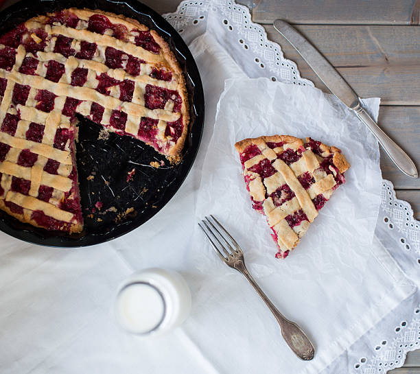 istock Homemade cherry pie on wooden table. 502577128