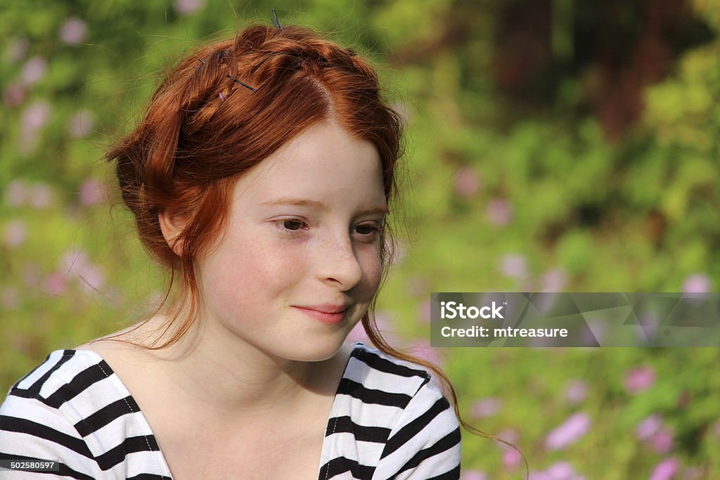 Image Of Girl In Garden Smiling With Milkmaid Braid Hairstyle Stock Photo -  Download Image Now - iStock