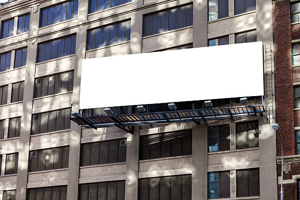 Big, horizontal, billboard on the building wall. stock photo