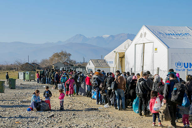 Refugees waiting for registration at the Macedonian Border stock photo