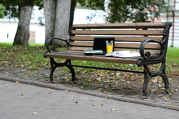 istock books on a bench in the school year 502583566