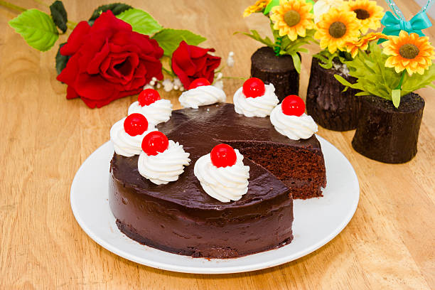 istock chocolate cake with red Jelly on top 502584329