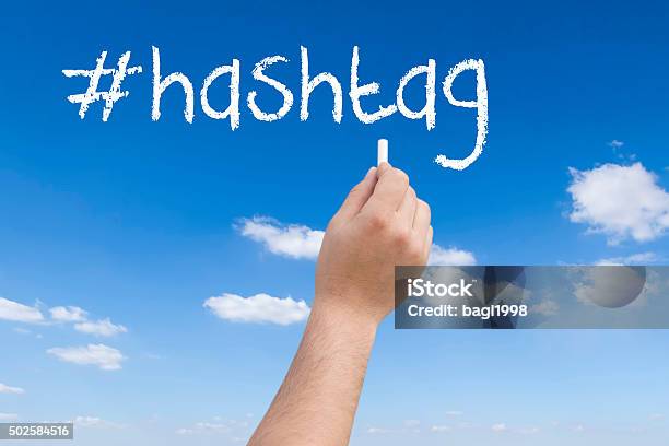 Businessman Writing Hashtag With Marker On Sky Stock Photo - Download Image Now - 2015, Brand Name Online Messaging Platform, Chalk - Art Equipment