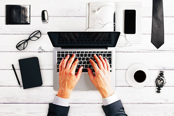 istock Working man with laptop, cup of coffee, glasses 502585382