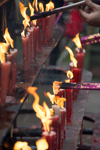 burning incense in a Chinese Temple.