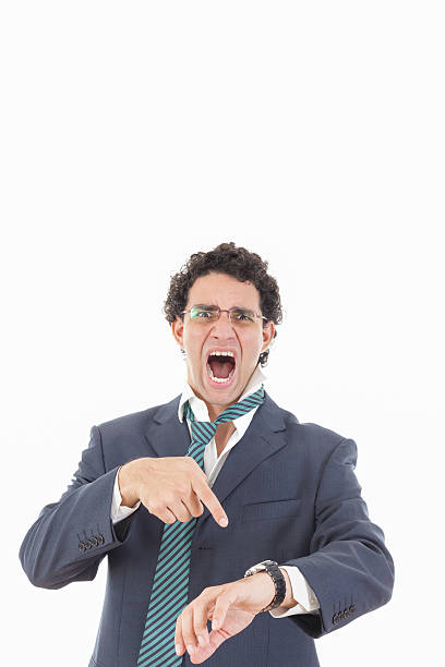 istock expressive angry businessman with galsses late for work 502586337
