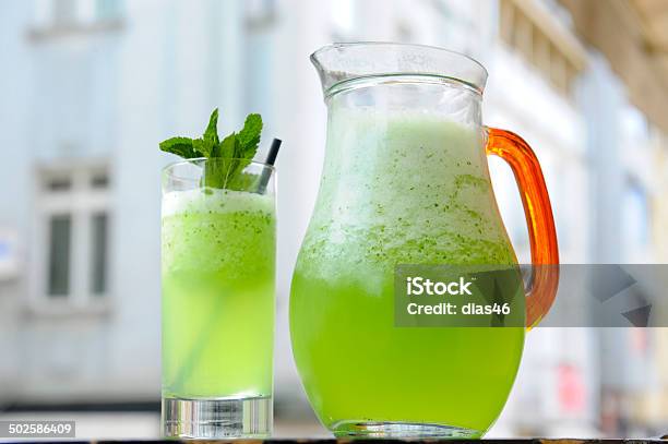 Glass And Pitcher Of Fresh Homemade Lemonade Stock Photo - Download Image Now - Antioxidant, Blended Drink, Cafe Culture