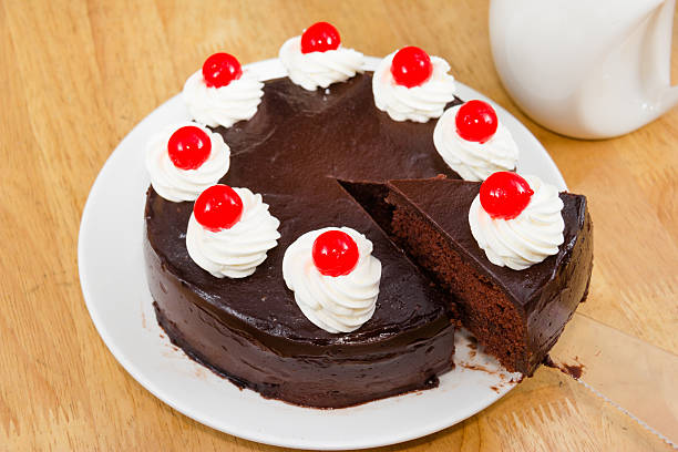 istock chocolate cake with red Jelly on top 502600869