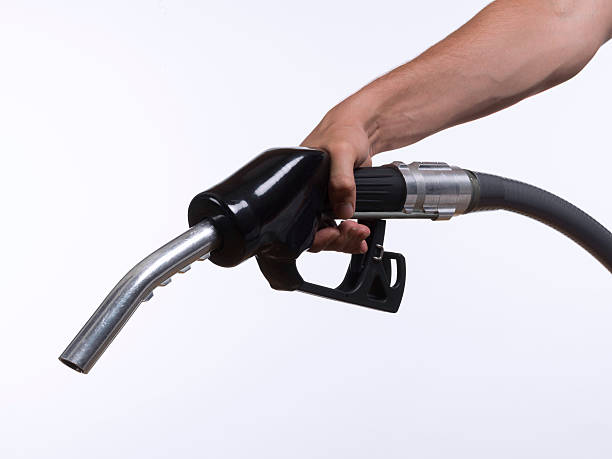istock Hand holding a gas pump 502605633