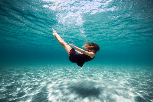 Woman is falling in the water