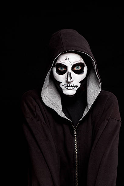 istock Person Wearing Skull Halloween Makeup 502606753