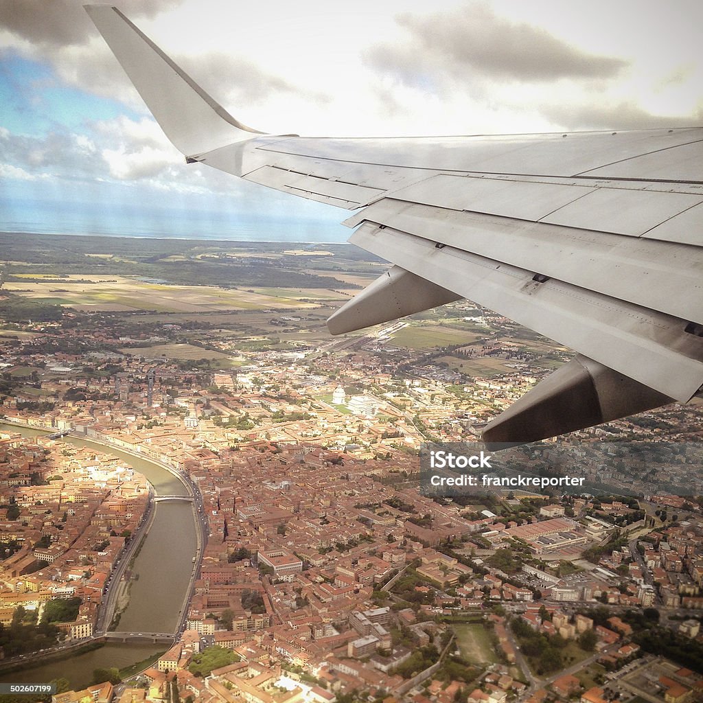 winglet of a commercial airplane over the pisa city http://blogtoscano.altervista.org/ob.jpg   Aerial View Stock Photo