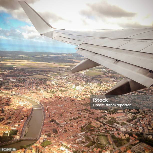 Winglet Of A Commercial Airplane Over The Pisa City Stock Photo - Download Image Now