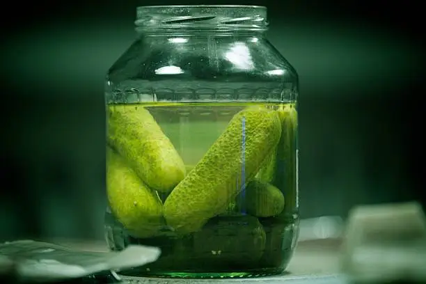 Close-up shot of a pickle jar.