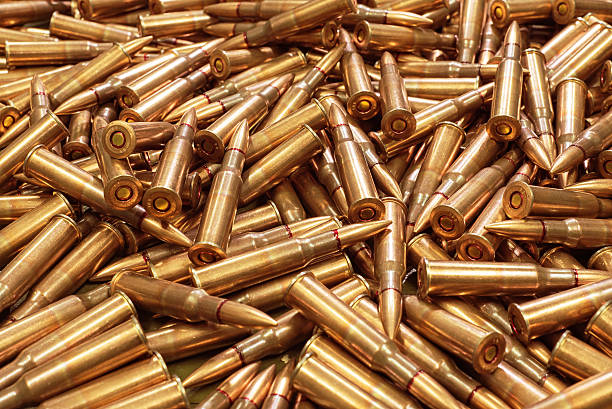 istock ammo to machine guns as background 502611166