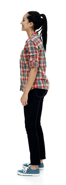 istock Smiling female standing and looking away 502612534